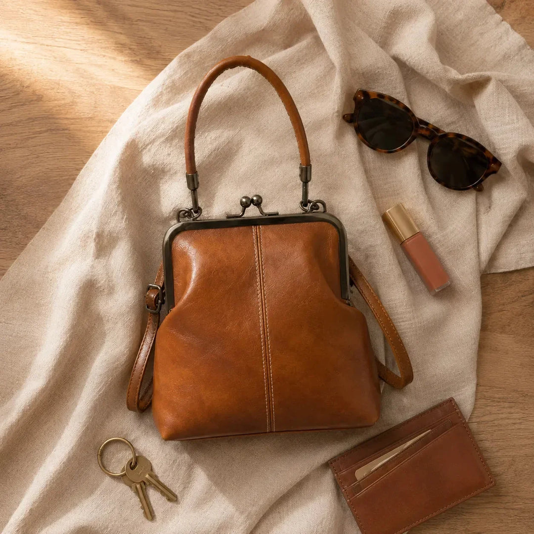 KIMA | VINTAGE KISS LOCK CROSSBODY BAG WITH TOP HANDLE